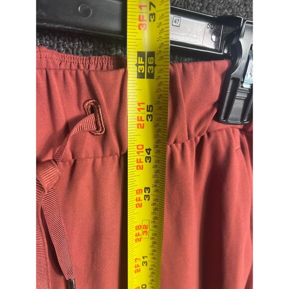 Lululemon On The Fly 7/8 Pants Womens Size 4 Red Dust Travel Woven Drawstring - Picture 5 of 7